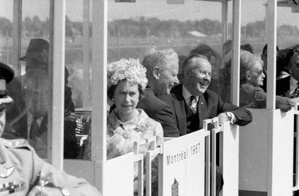 Black and white photograph of Her Majesty Queen Elizabeth II and Prime Minister of Canada Lester B. Pearson in the minirail at Expo 67