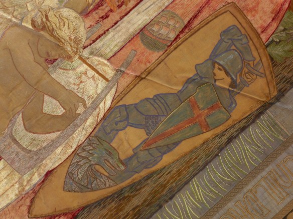 Part of the fabric depicting St. George, patron saint of England and the dragon.