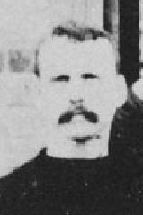 Detail from the black-and-white photograph of the first basketball team. 