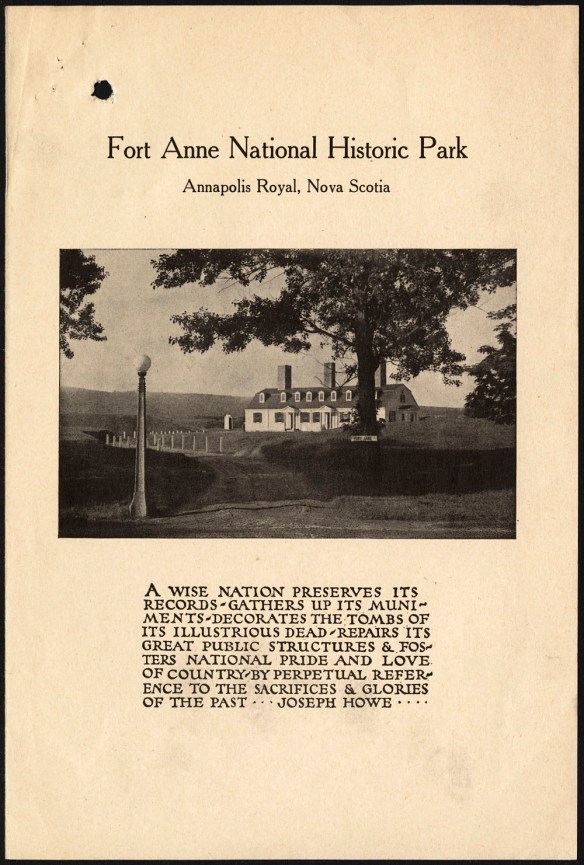 The front page of this Fort Anne National Historic Park leaflet has a photo of the park showing the guard house behind a tree and the fort walls in the distance, along with a quote from Joseph Howe written underneath. 
