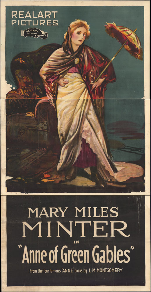 Colourful print of Anne wearing dress-up clothes against a green backdrop. She is holding a red and yellow parasol, and wearing black boots, a red skirt under a high white overskirt, and a brown shawl. The Realart Pictures logo is in the top left corner, with the actress’s name and the title of the movie along the bottom.