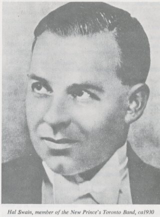 A black-and-white photograph of a young man looking pensively to the side.