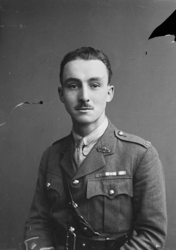 A black-and-white photograph of a soldier.