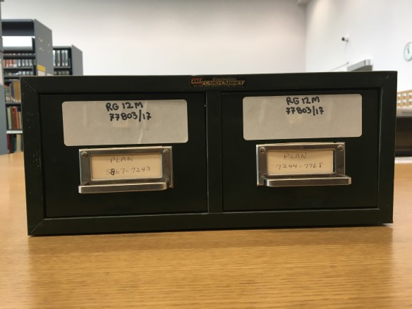 Colour photograph of metal drawers of index cards for accession RG12M 77803/17.