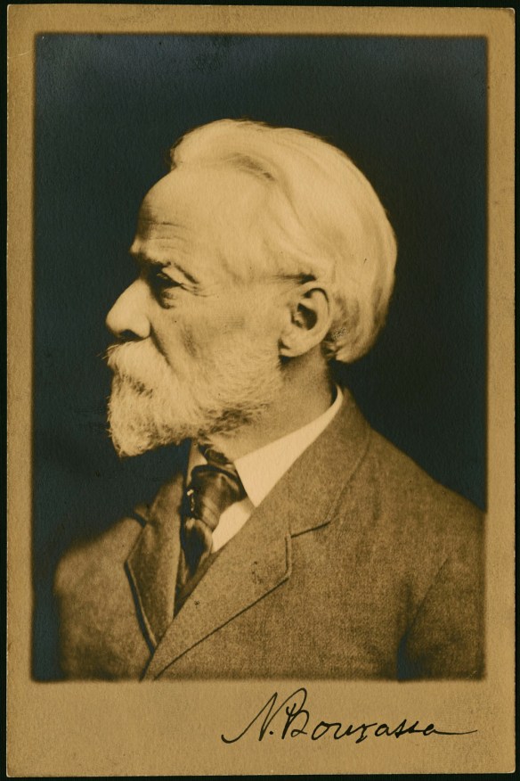 A black-and-white photograph of Napoléon Bourassa’s left profile. 