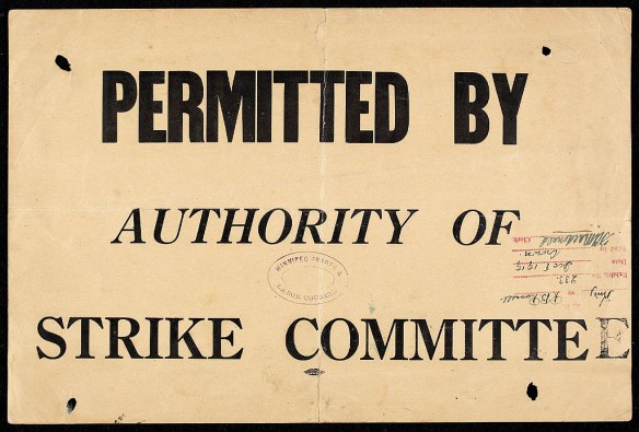 Sign reading “Permitted by authority of strike committee,” with a date stamp and a signature authorizing the notice. 