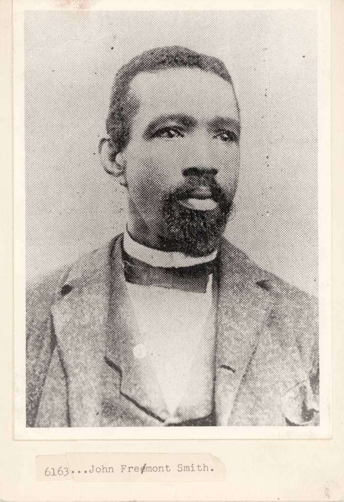 Head-and-shoulders portrait of John Freemont Smith.